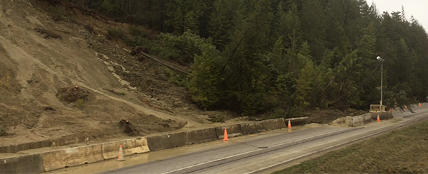 Mudslide caught on camera totally covers road