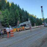 Photo of crane that fell June 29, 2019 while installing a temporary bridge for US-95 construction in Culdesac Canyon Phase 2.