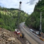 Two cranes help with 2019 construction of a passing lane in Culdesac Canyon just north of Winchester.