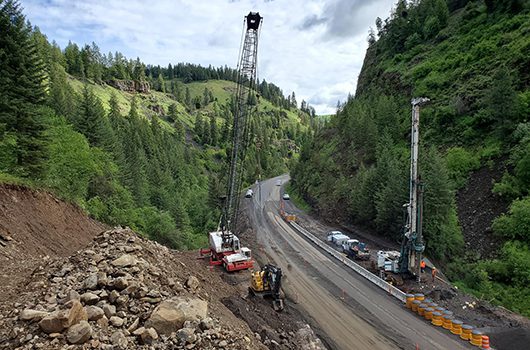 Two cranes help with 2019 construction of a passing lane in Culdesac Canyon just north of Winchester.