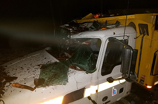 Plow truck damaged by a tree on ID-162 MP 21