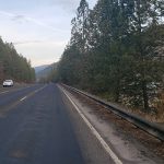 A car passes the Orofino Airport on US-12