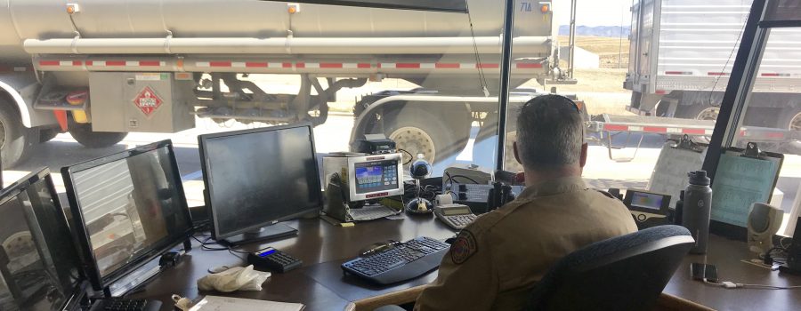 Inspector David Larsen looks on as trucks drive through the East Boise Port of Entry.