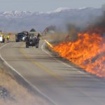 BLM fire crew conducts controlled burn along a highway