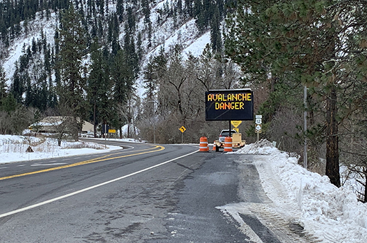 A sign along US-12 warns drivers of avalanche danger