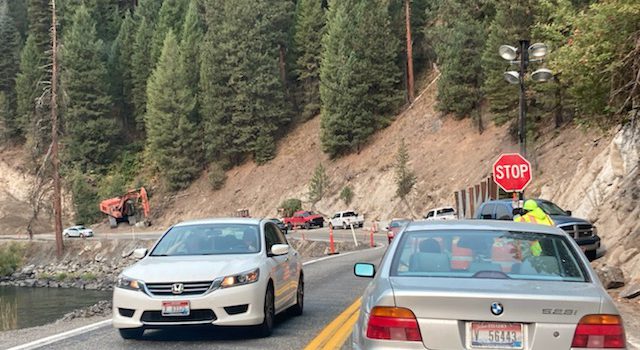 Cars stopped by flagger on Idaho Highway 55