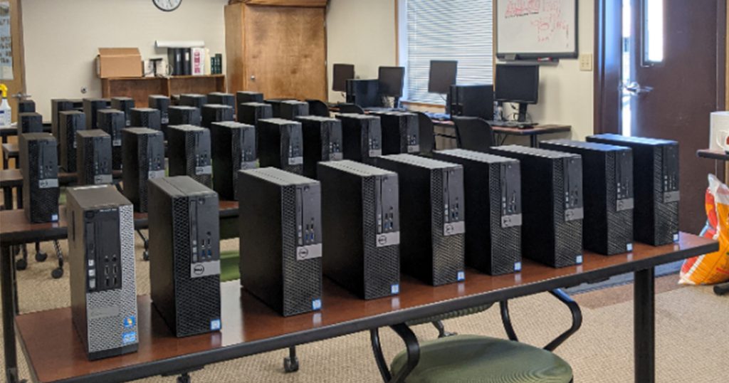 ITD staff donate surplus computers to Women’s and Children’s Alliance