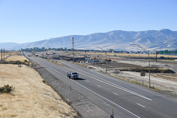 View of construction site at System Interchange looking south with large crane in center