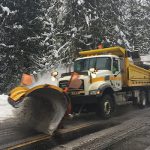 Plow clearing SH-6 near White Pine Campground