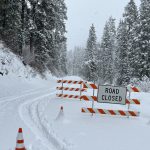 Barricades up to close SH-21 at milepost 48 in November of 2022