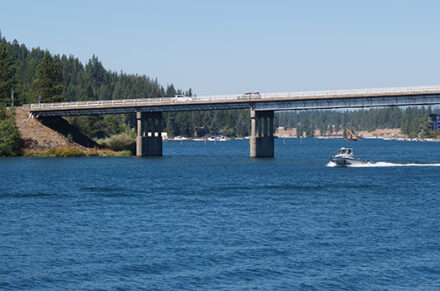 Boat under the Spokane River bridge