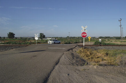 railroad crossing at Deb Lane and US-20/26