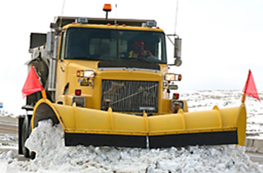 ITD plow clearing snow