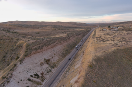 Cars travel down Freezeout Hill