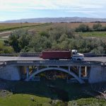 A truck crosses an old bridge near Murtaugh