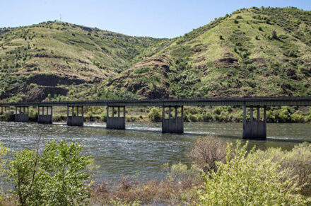 View of US-95 Spalding Bridge with hills in the background.