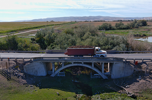 A truck crosses an old bridge near Murtaugh