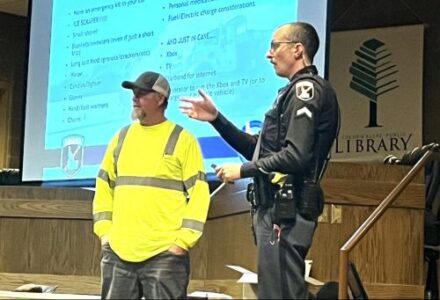 ISP Trooper and ITD plow driver teaching during a winter driving safety class in Coeur d'Alene