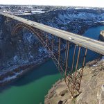 Drone shot of the Perrine Bridge with snow on the ground