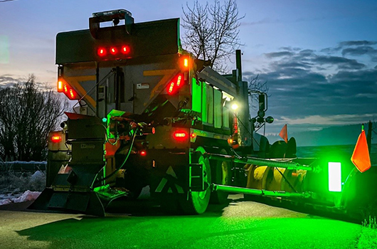 Bright green LED light on wing plow