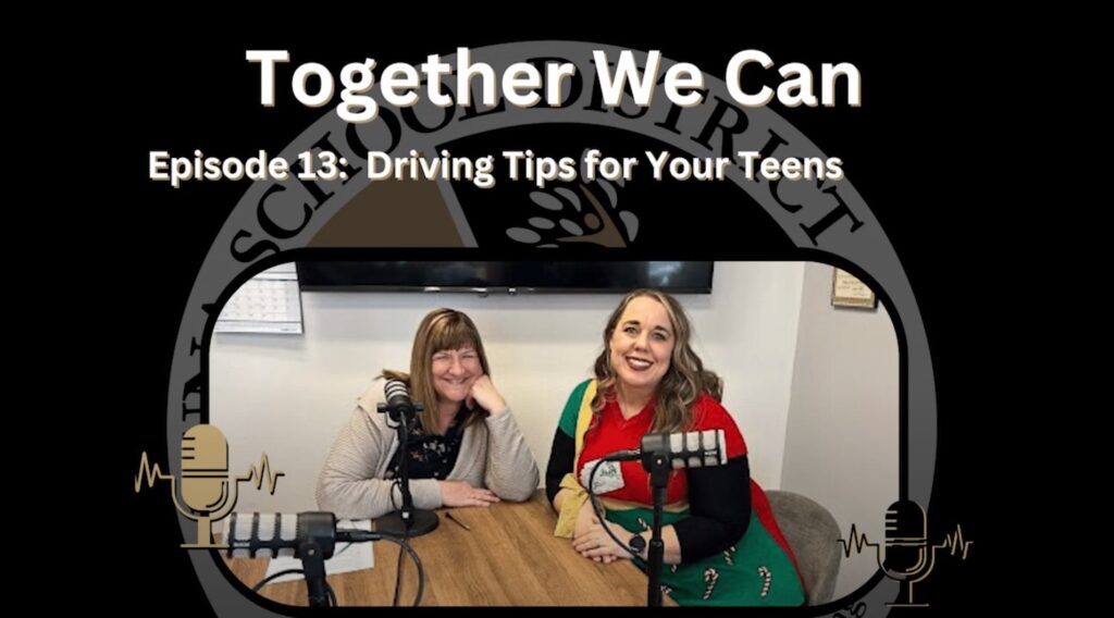 Two women with podcast microphones.