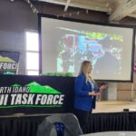 woman delivering a presentation for an audience