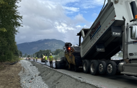 Crews work to pave a new section of SH-200 near Kootenai.