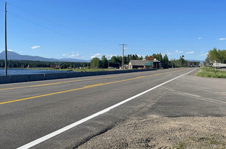 US-20 through Last Chance in the Island Park area with Henry's Fork of the Snake River in the background