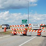 Road closed signs at Exit 332 on US-20 in Rexburg.