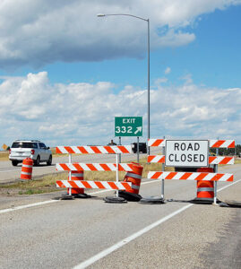 US-20 Exit 332 University Blvd Rexburg road closed barricade during exit closure for construction of new interchange design