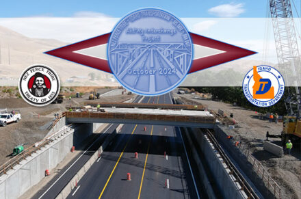A picture of the US-95 Aht'Wy interchange with a commemorative, embossed logo in the center and ITD/NPT logos around it.