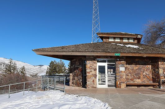 The stone building containing bathroom facilities at Clark Hill Rest Area along US-26 between Ririe and Swan Valley.