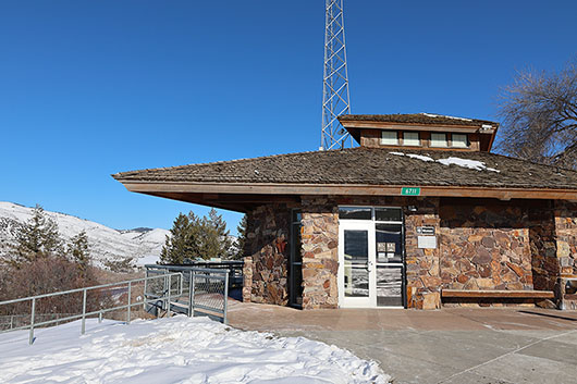 The stone building containing bathroom facilities at Clark Hill Rest Area along US-26 between Ririe and Swan Valley.