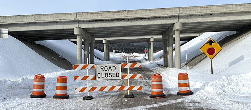 Road Closed signs in place on Stoddard Creek Road underneat I-15 Stoddard Creek Exit 184.