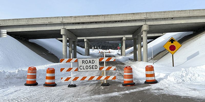 Road Closed signs in place on Stoddard Creek Road underneat I-15 Stoddard Creek Exit 184.