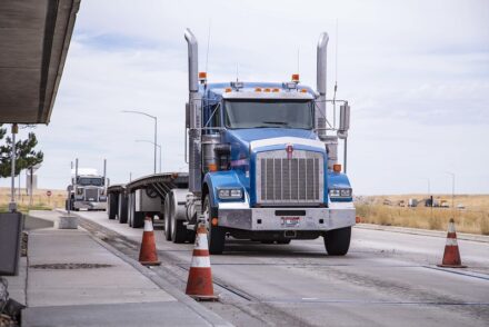 A semi truck at a port of entry.