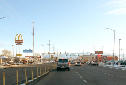 Image of traffic stopped at an intersection.
