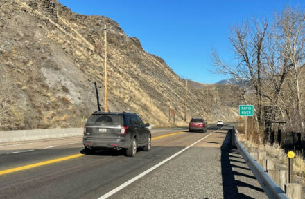 Cars are driving across the US-95 Rapid River Bridge near Riggins.