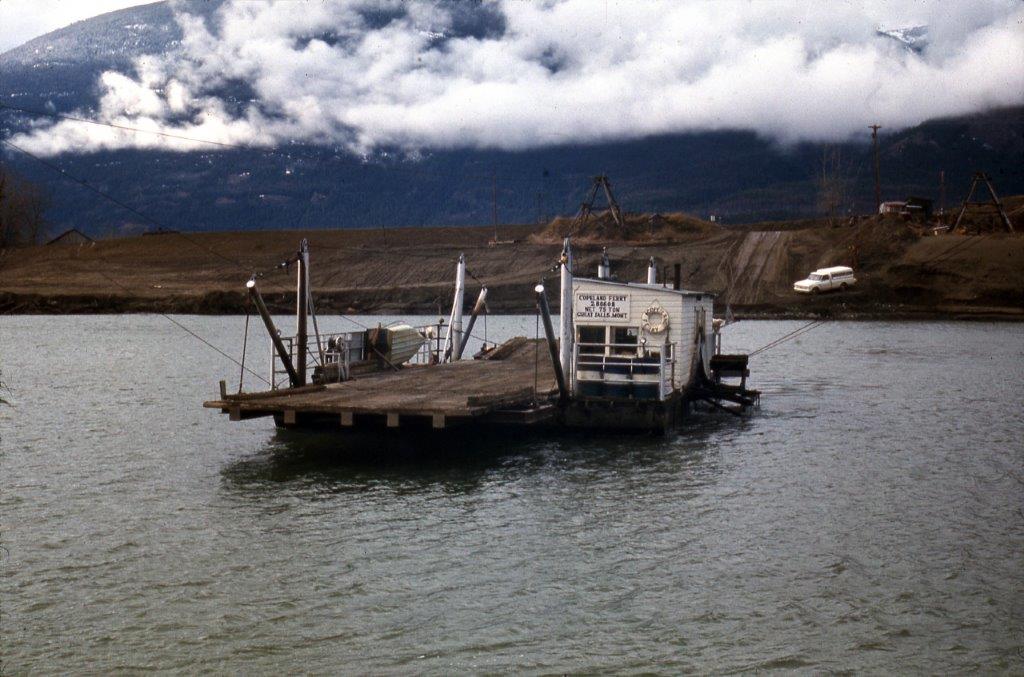 Historical photo of a barge being used in early construction of the Long Bridge