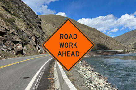 A "Road Work Ahead" Sign superimposed over a picture of US-95 Bull's Eye near Riggins.