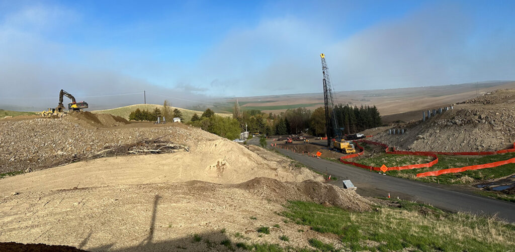 View of the project during construction. A crane can be seen in the distance where the bridge near Eid Road.