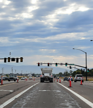 Construction barrels next to a turn lane