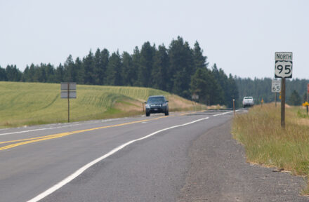 A view looking down US-95 near Winchester and a blue SUV can be seen in the distance.