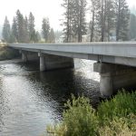 The aging State Highway 21 bridge over the South Fork of the Payette River in Lowman will soon be replaced with a modern structure that improves safety for both drivers and pedestrians. Traffic control for this multi-season project begins setting up next week.