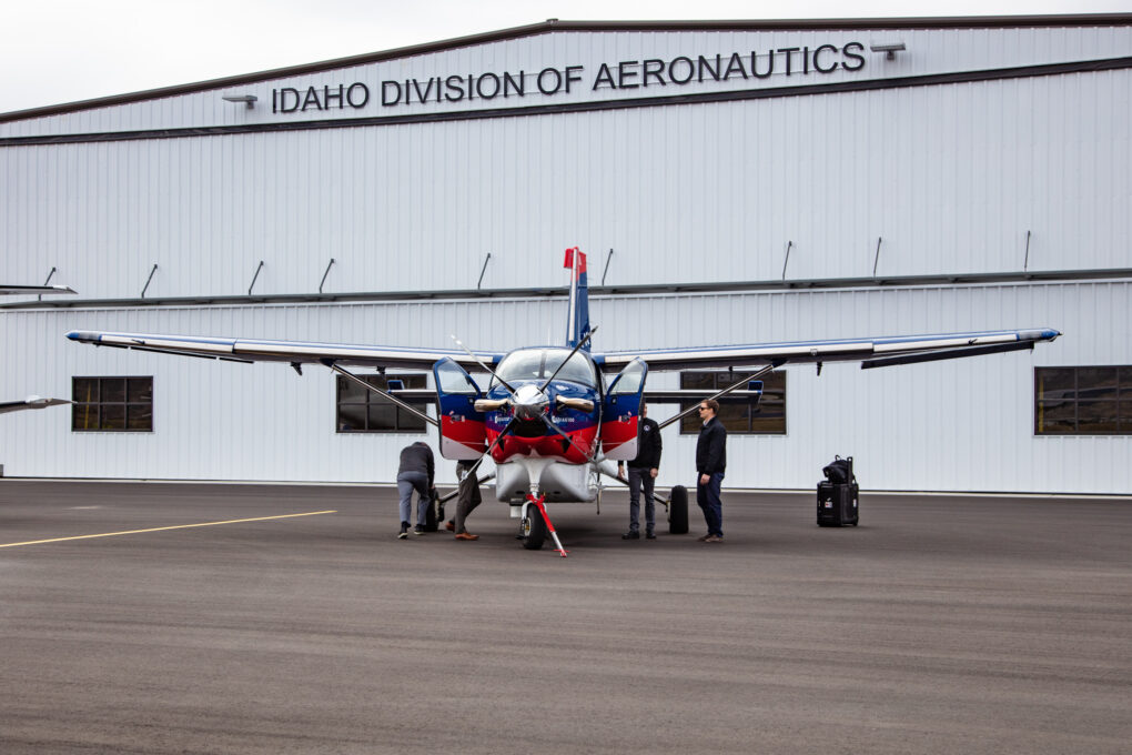 Passengers with luggage about to board a plane
