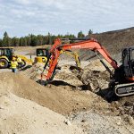 Picture of an excavator and backhoe.