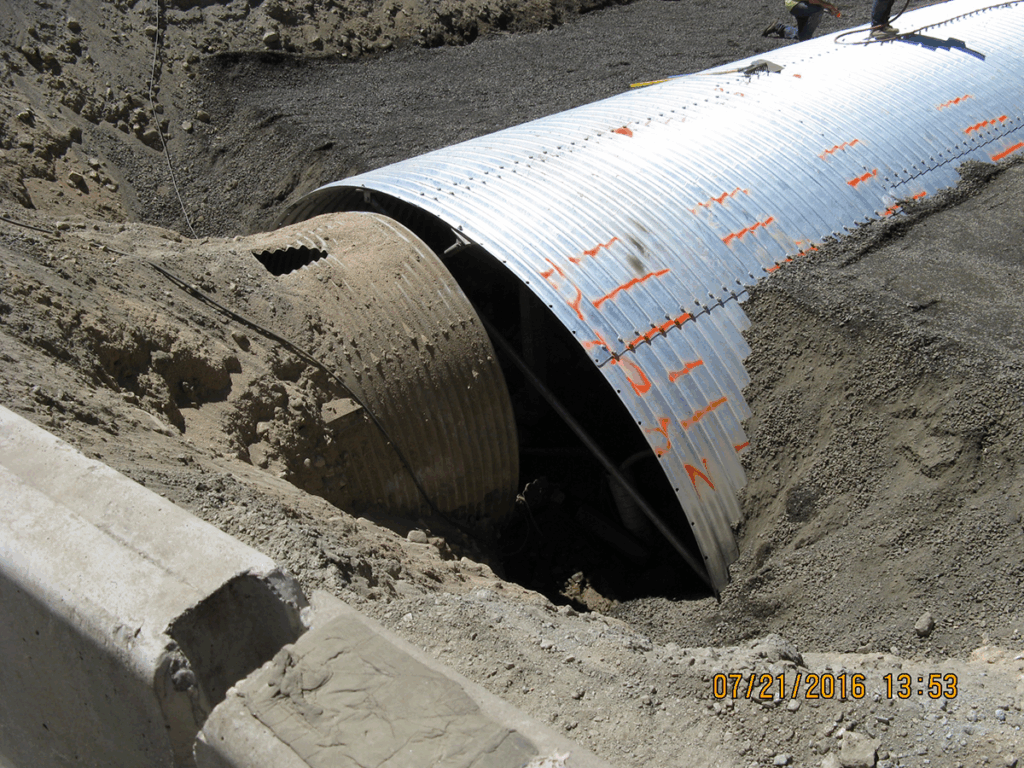 Two culverts side by side. The new culvert is much larger.