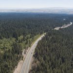 Cars take the highway up a hill in East Idaho