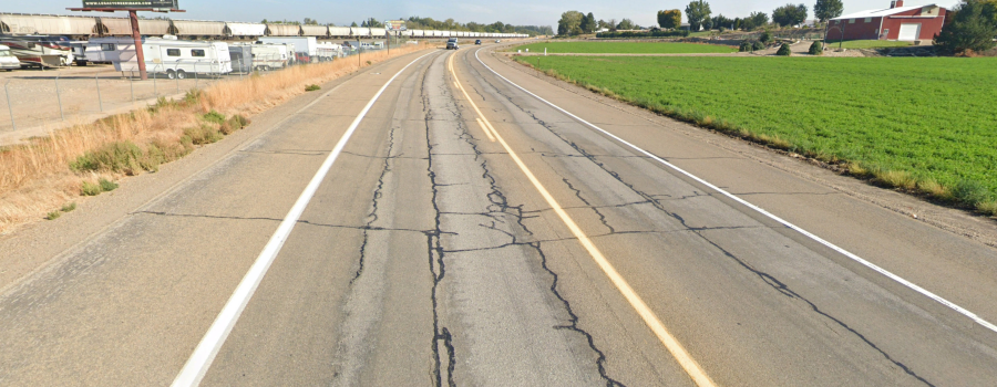 Section of US-95 showing distress and cracking