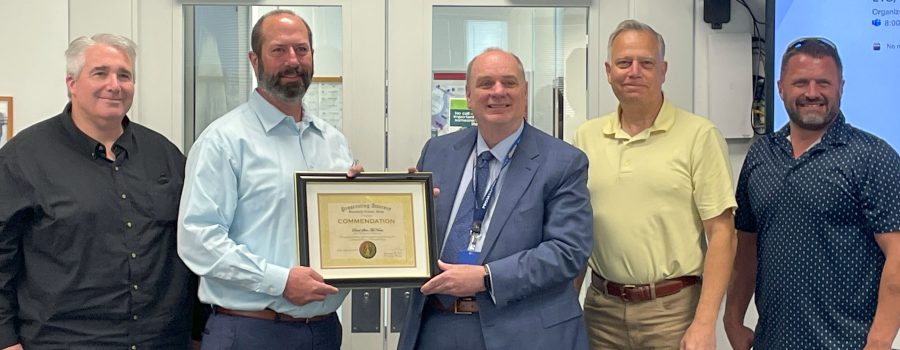 Idaho Transportation Department's Directors, District Engineer and Bonneville County Prosecutor with Shea McNama, receiving a high honor award for his assistance with a murder conviction.
